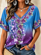 Blusa con cuello en V, encaje, pedrería y bordado floral