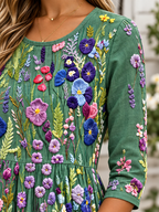 Vestido midi verde con estampado floral multicolor, cuello redondo y manga 3/4