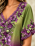 Blusa con cuello en V, encaje, pedrería y bordado floral