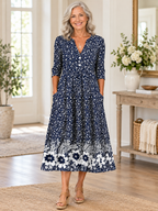 Vestido midi elegante con estampado floral, escote en V y manga al codo