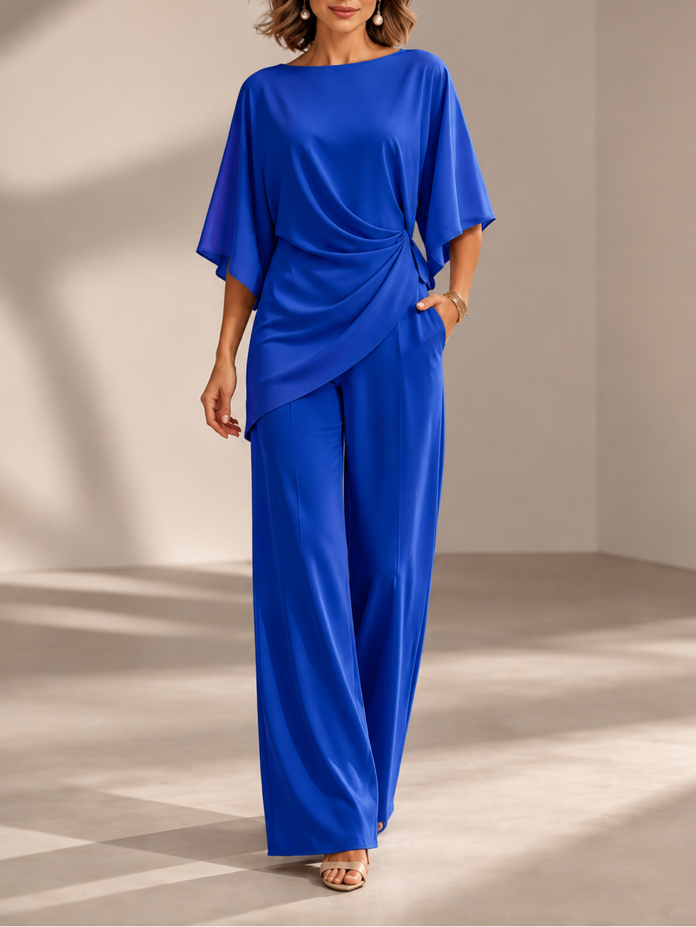 Conjunto de blusa drapeada y pantalón de pierna ancha