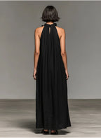 Vestido maxi tipo halter con ribete de volantes y bolsillos