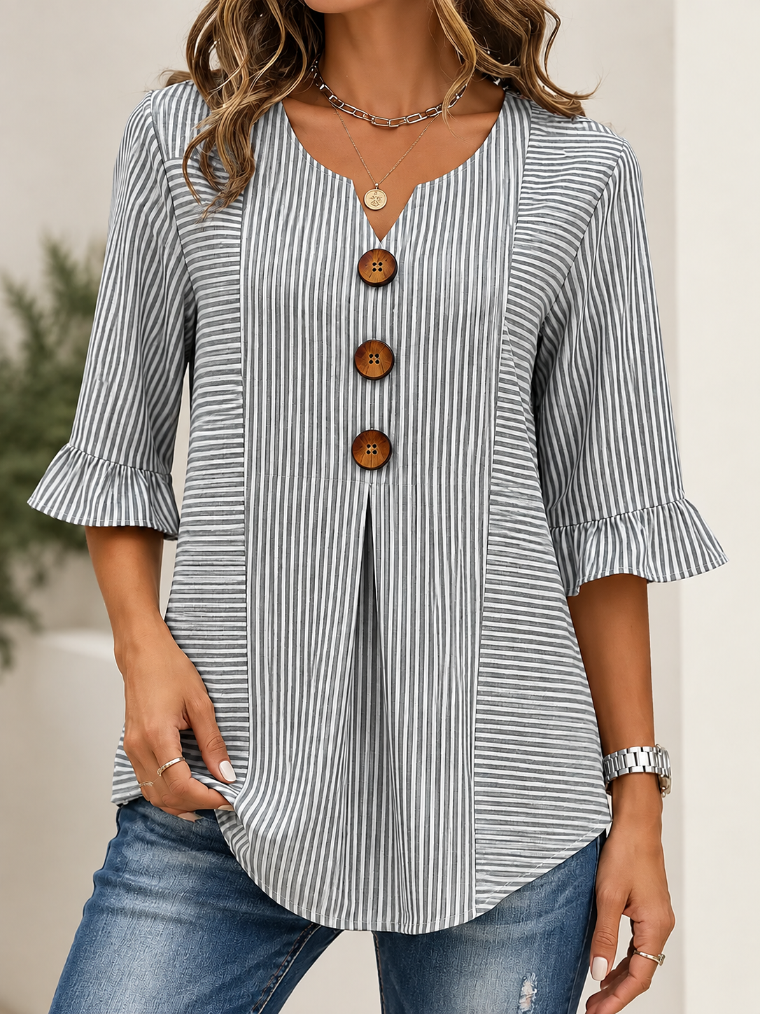 Blusa casual de rayas con cuello en V y manga 3/4