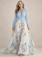 Vestido largo de gasa con estampado floral y escote pronunciado de manga larga