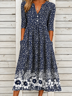 Vestido midi elegante con estampado floral, escote en V y manga al codo